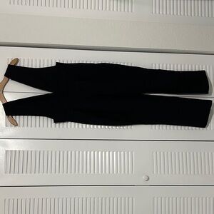 by the way. Classic Black Jumpsuit